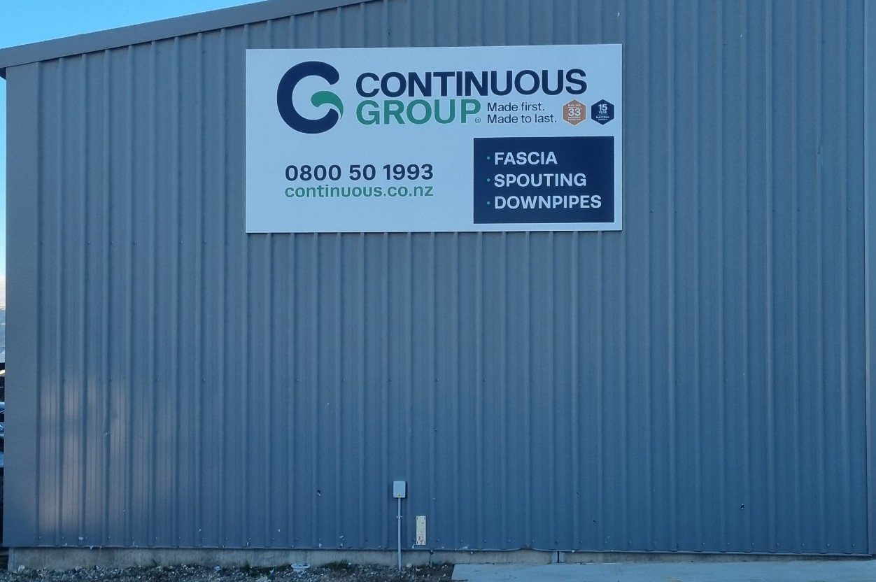 Continuous Group building sign