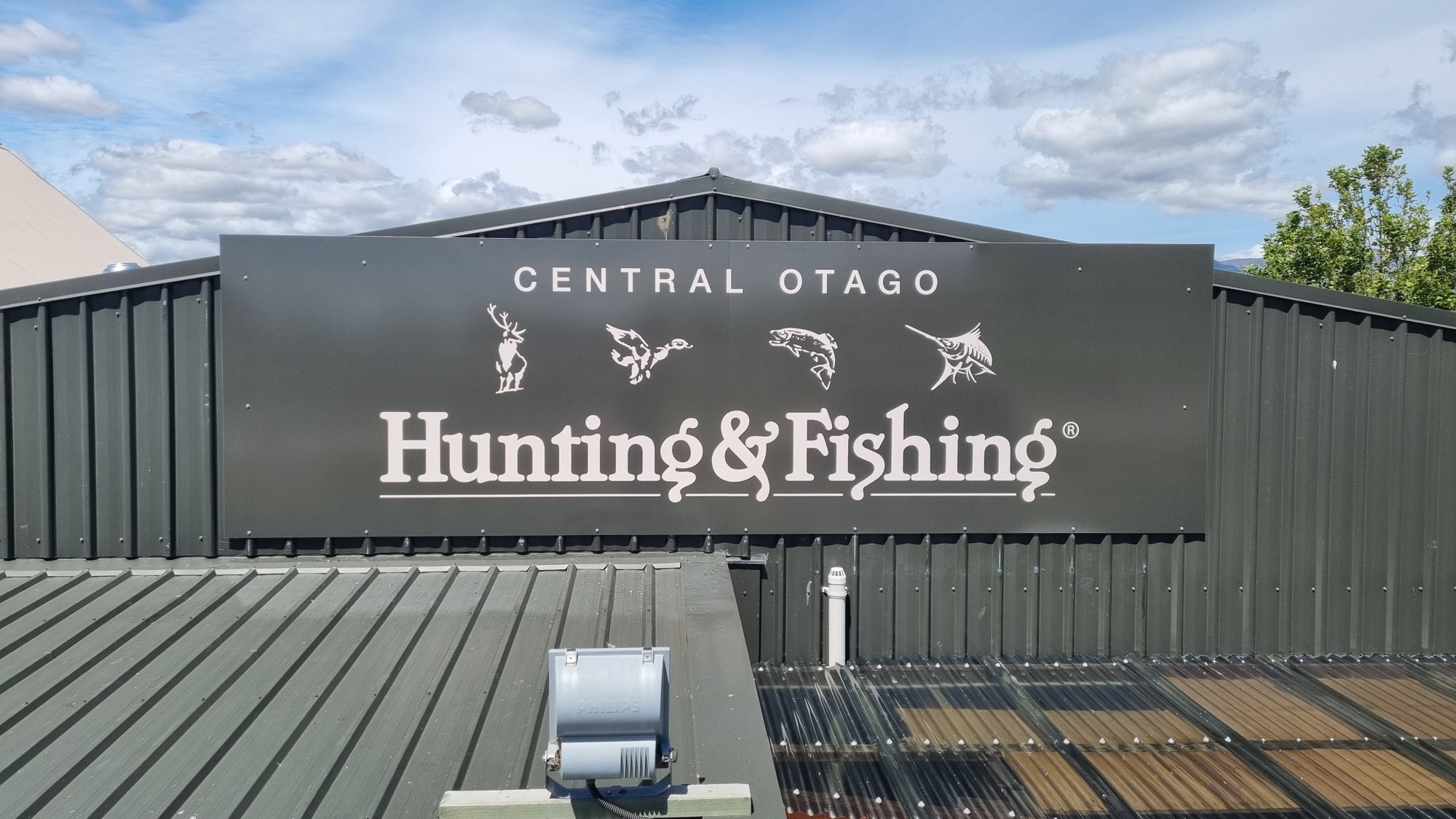 Hunting & Fishing building sign