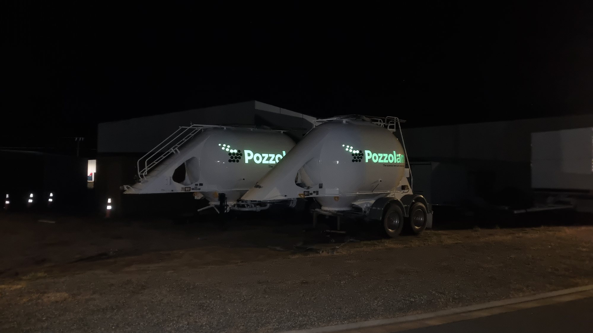 Pozzolan reflective graphics at night